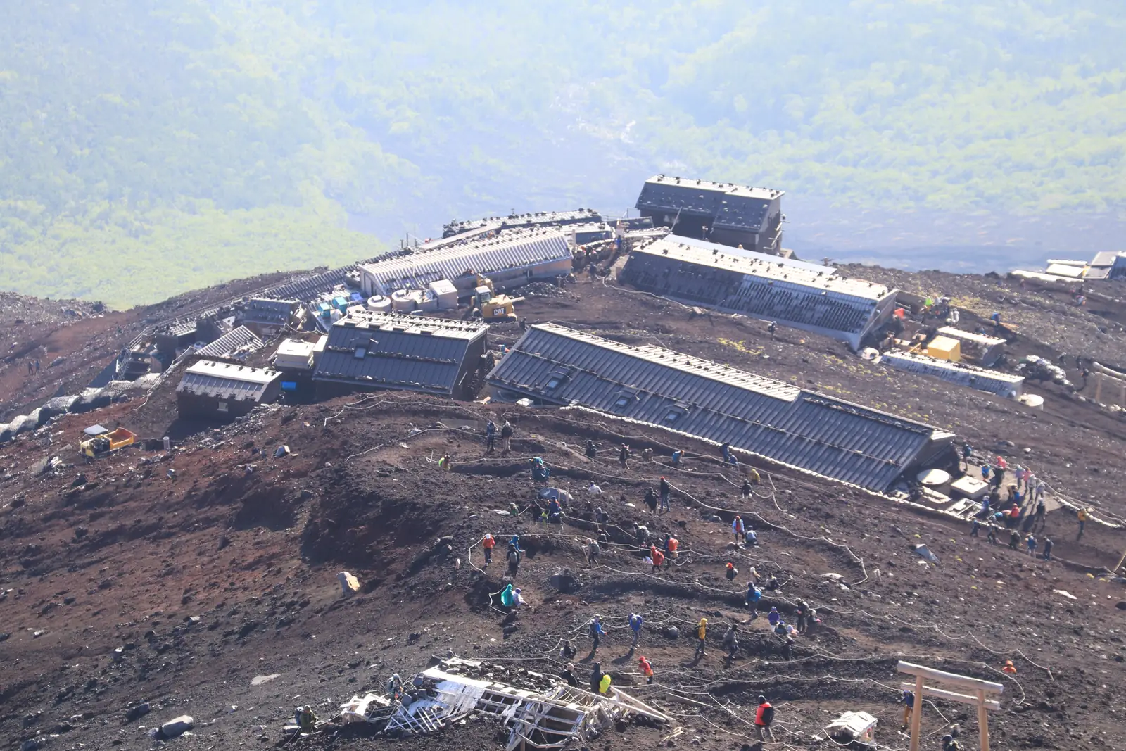 Climbers and mountain huts on the Yoshida Trail up Mount Fuji in July